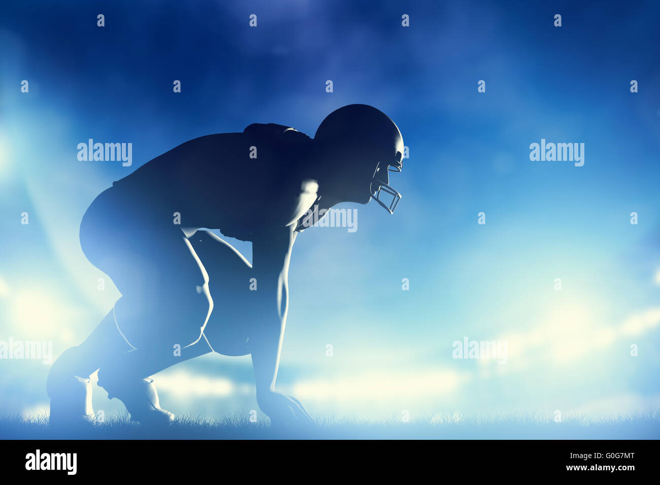 Giocatore di football americano in gioco. Di notte le luci dello stadio Foto Stock
