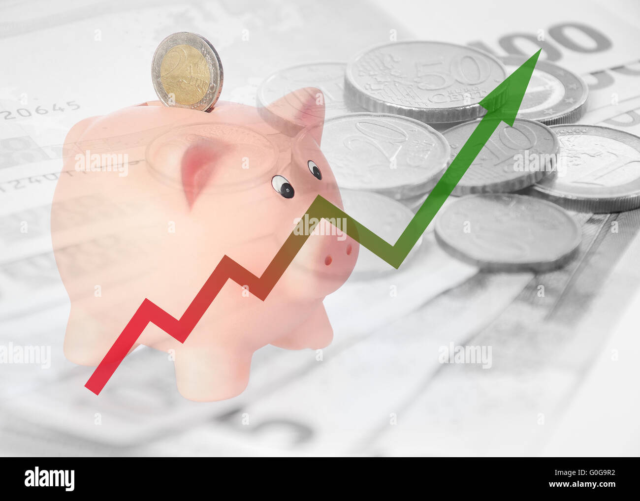 Salvadanaio con grafico delle monete in euro e in euro e bill Foto Stock