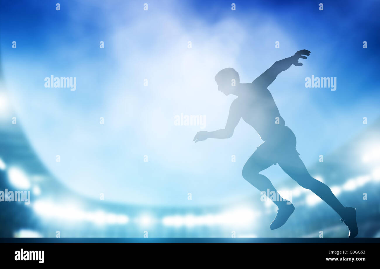 Inizio della corsa sullo stadio di notte le luci. Atletica leggera Foto Stock