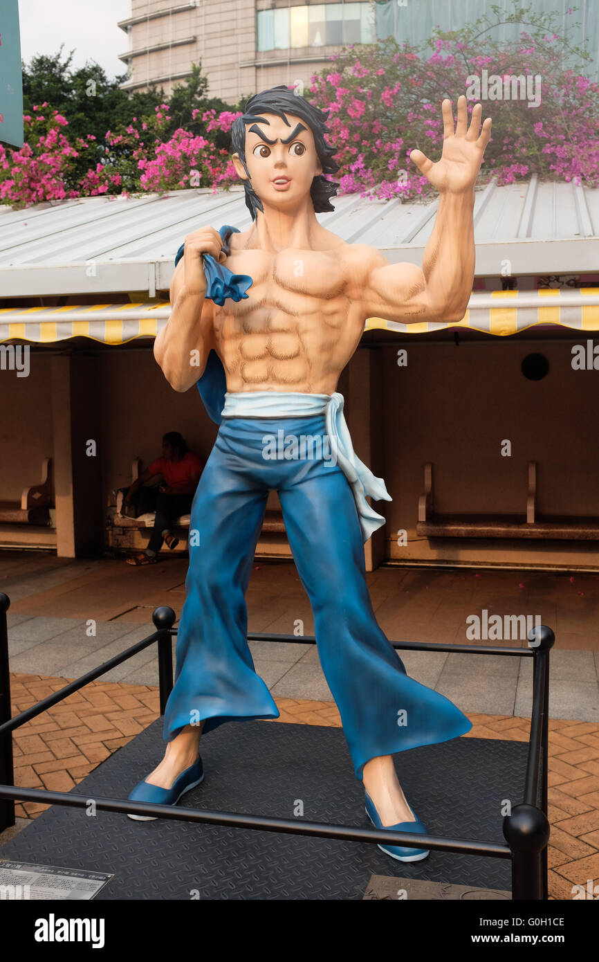 Una statua di Bruce Lee in Hong Kong Avenue di fumetto di stelle nel Parco di Kowloon, Hong Kong. Foto Stock