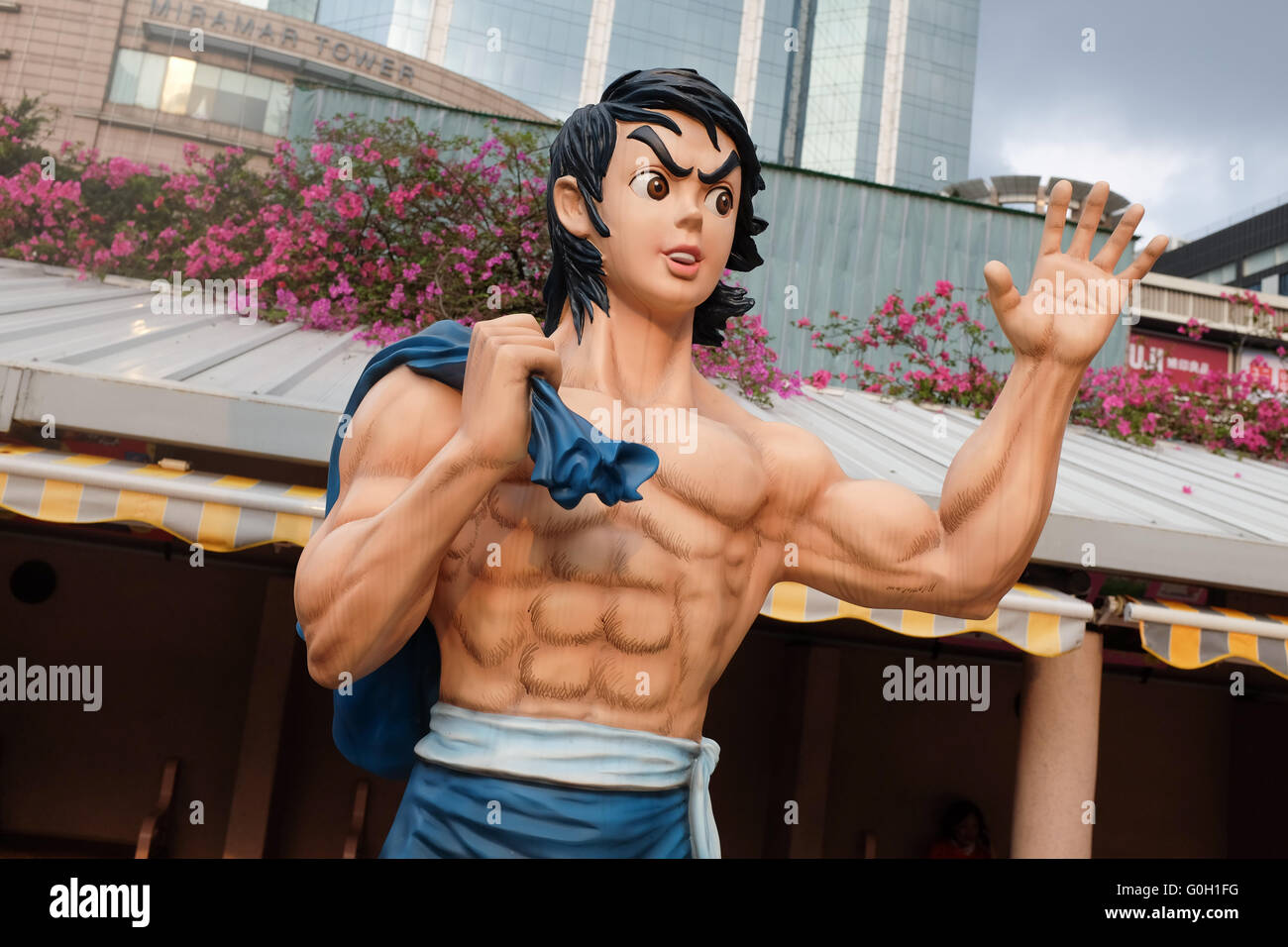 Una statua di Bruce Lee in Hong Kong Avenue di fumetto di stelle nel Parco di Kowloon, Hong Kong. Foto Stock