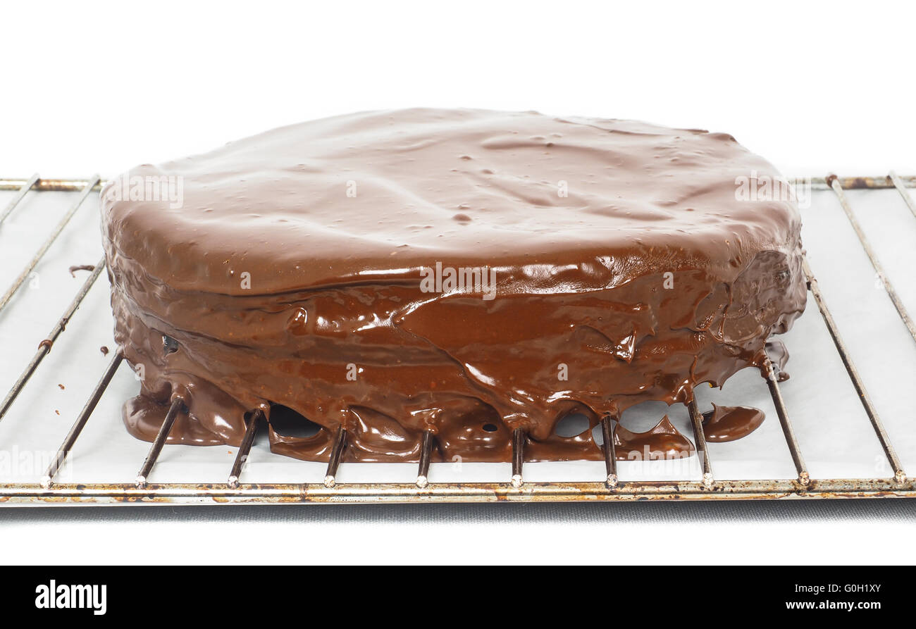 Glassa di cioccolato di sgocciolamento da freschi Sacher torte cake Foto Stock