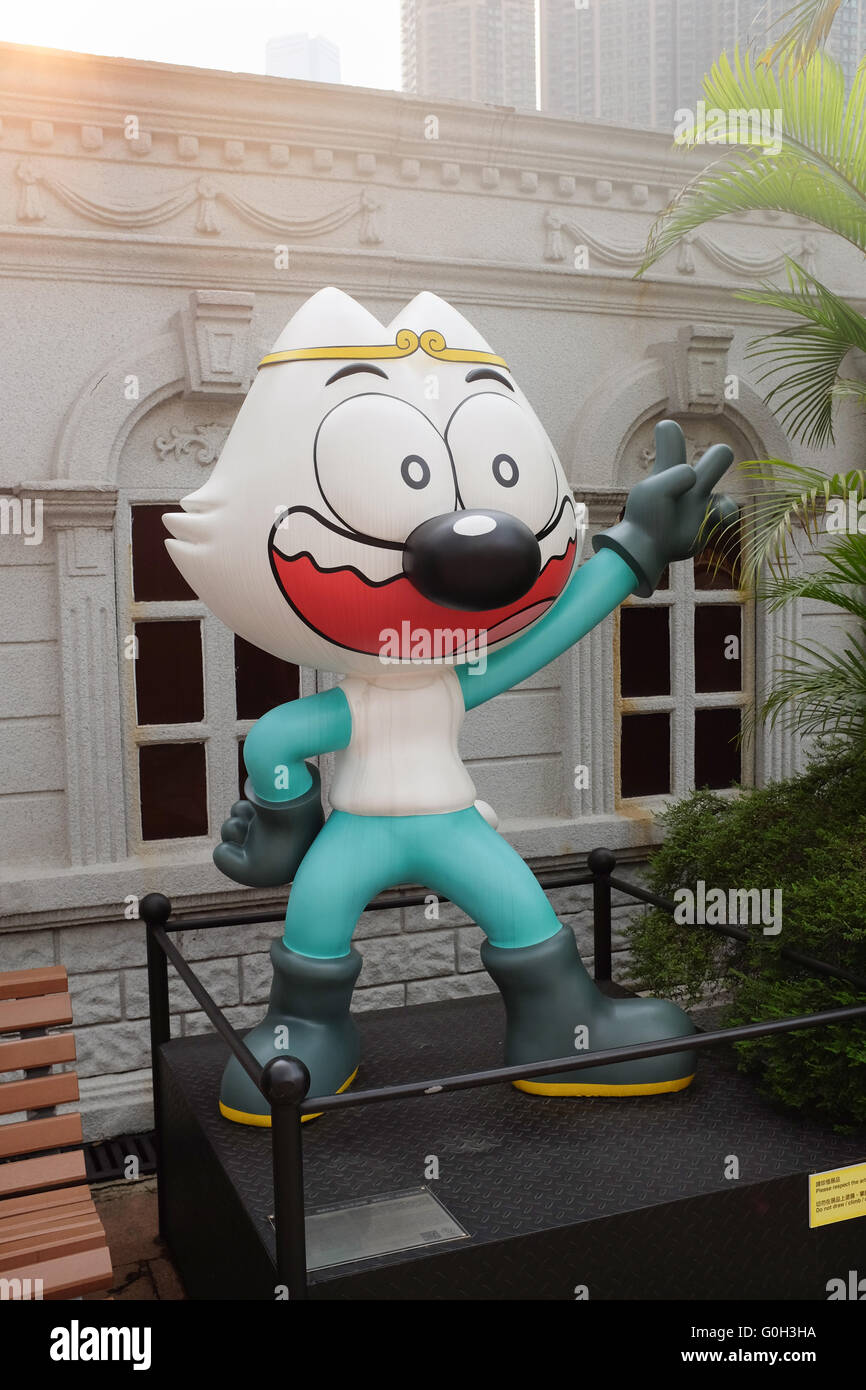 Una statua di Q Boy, un personaggio comico creato dall'artista ma Sing-yuen. Situato in Avenue of Comic Stars a Kowloon Park, Hong Kong. Foto Stock