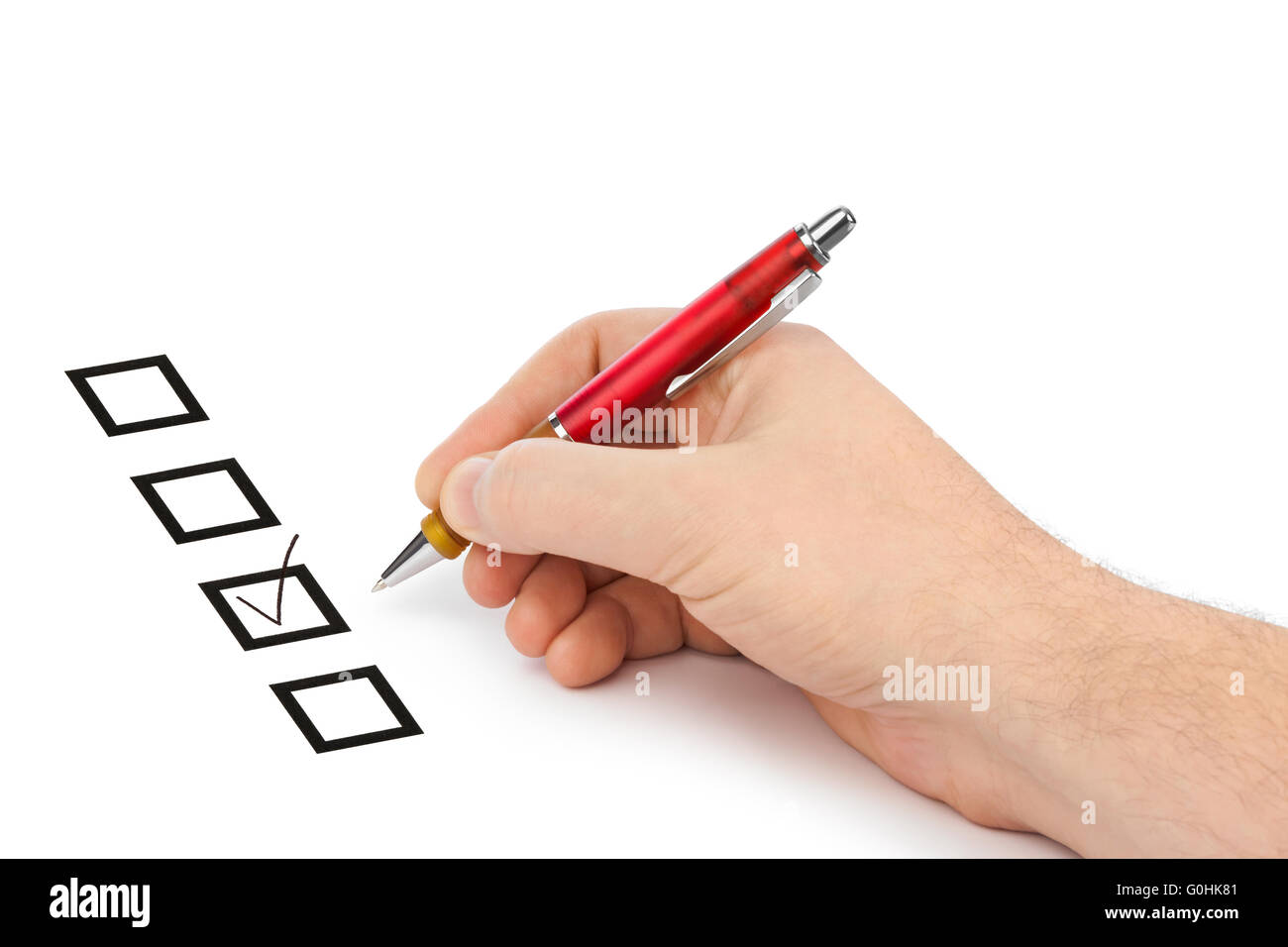 Mano con penna e caselle di controllo Foto Stock