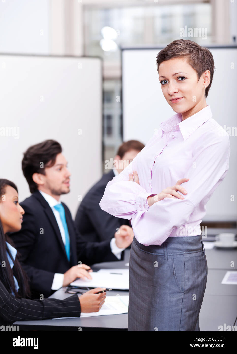 Professional business di successo di donna in ufficio sorridente Foto Stock