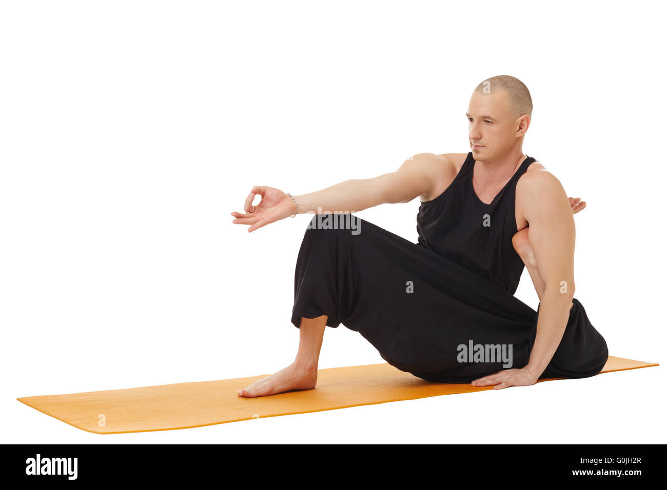Formazione di yoga. Studio foto di un uomo che esercitano Foto Stock