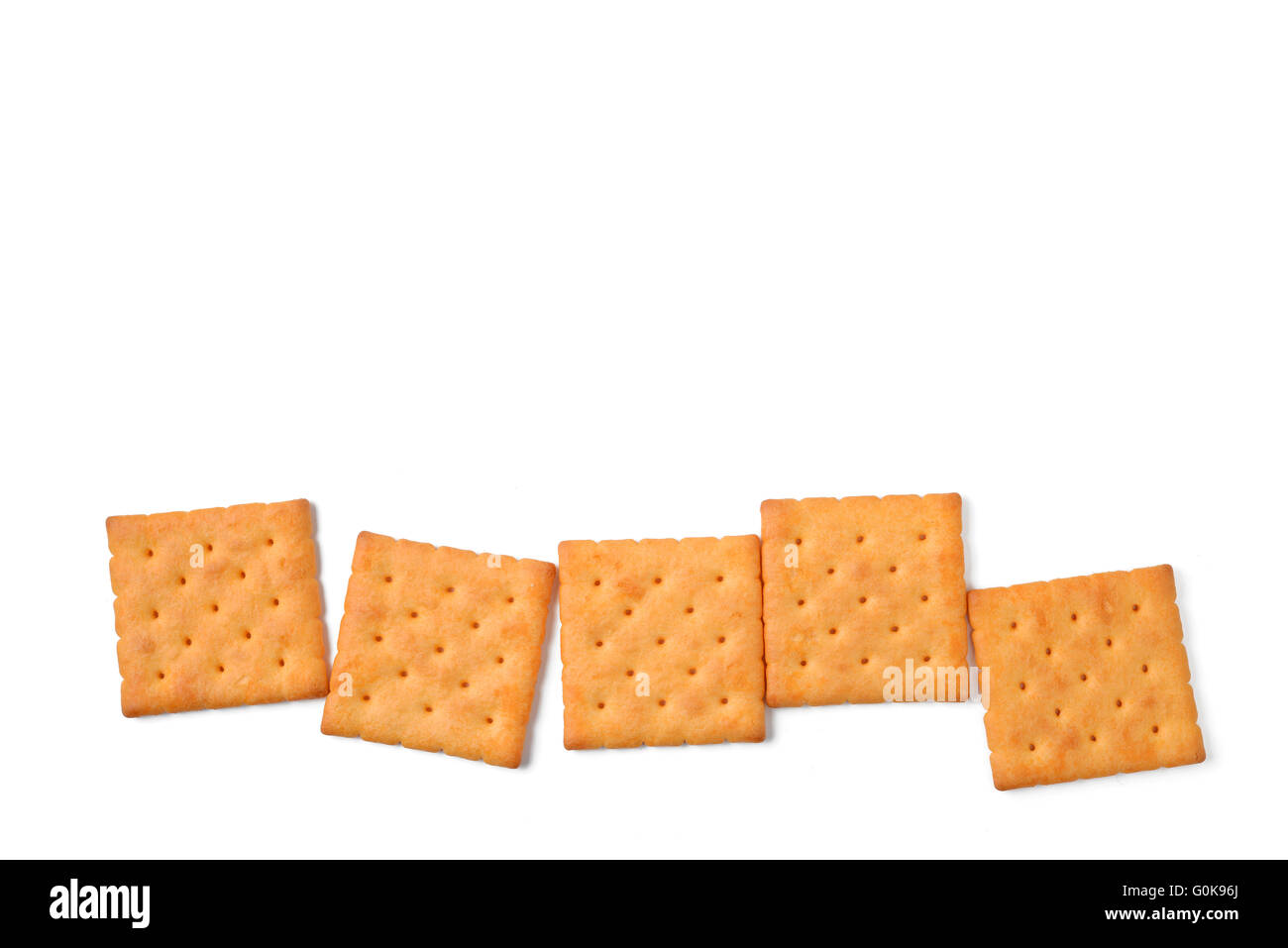 Il burro cracker su sfondo bianco Foto Stock