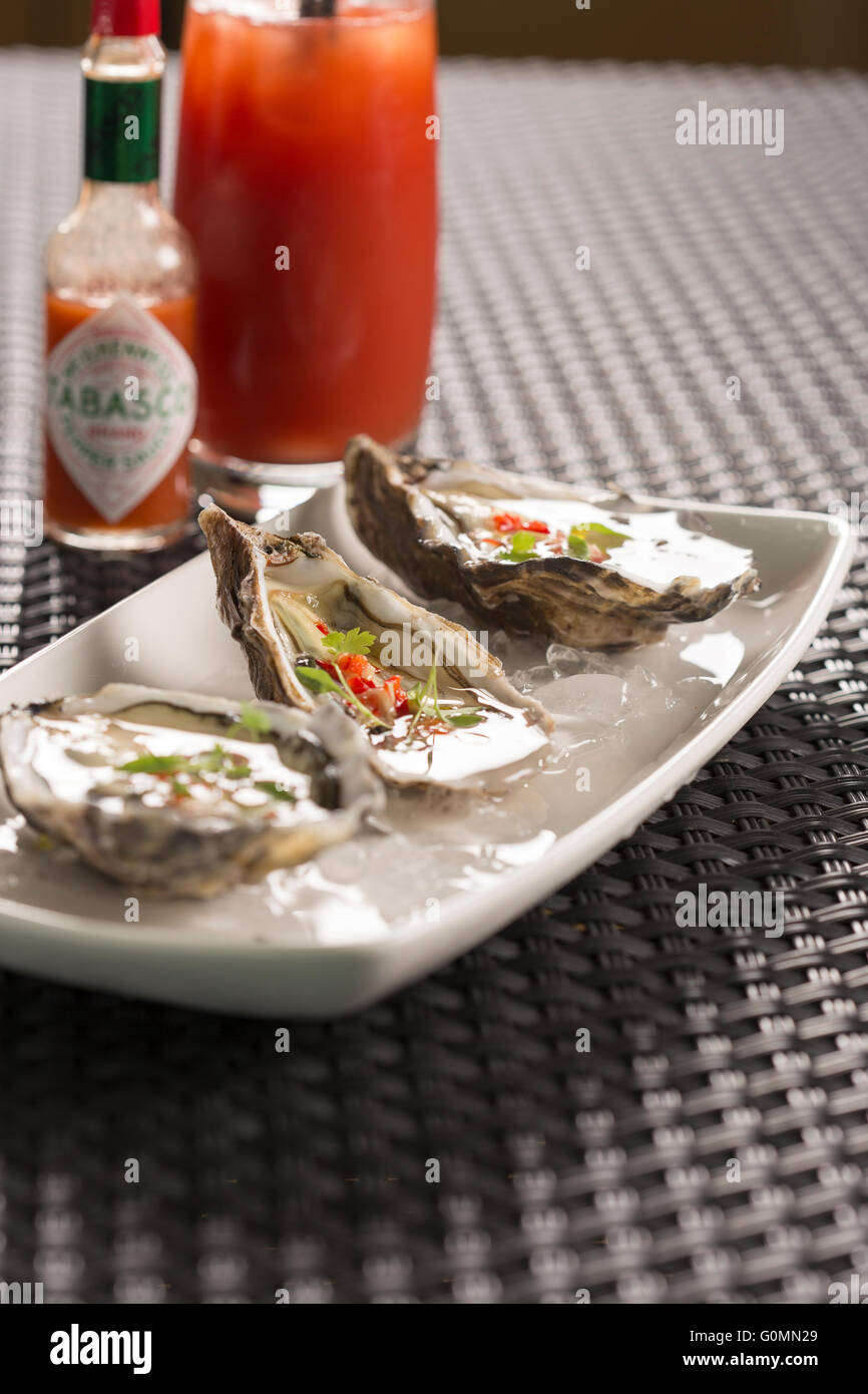 Maldon ostriche con peperoncino, Zenzero e aceto di riso Foto Stock