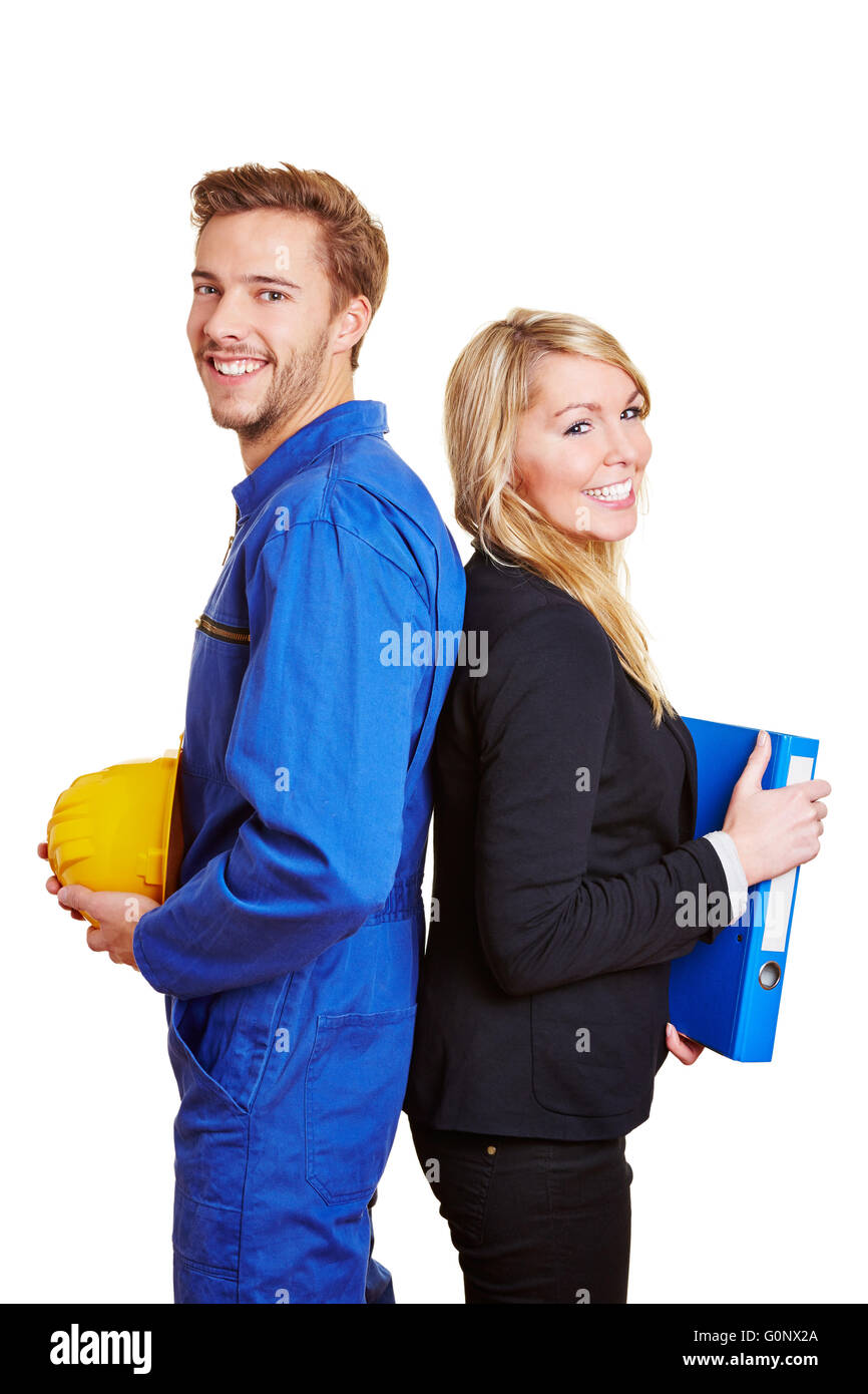 Lavoratore in generale e business donna in un abito di sorridere insieme Foto Stock