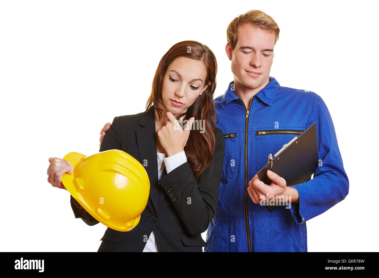 Cambiamento di carriera con il lavoratore e imprenditrice lo scambio di casco e appunti Foto Stock