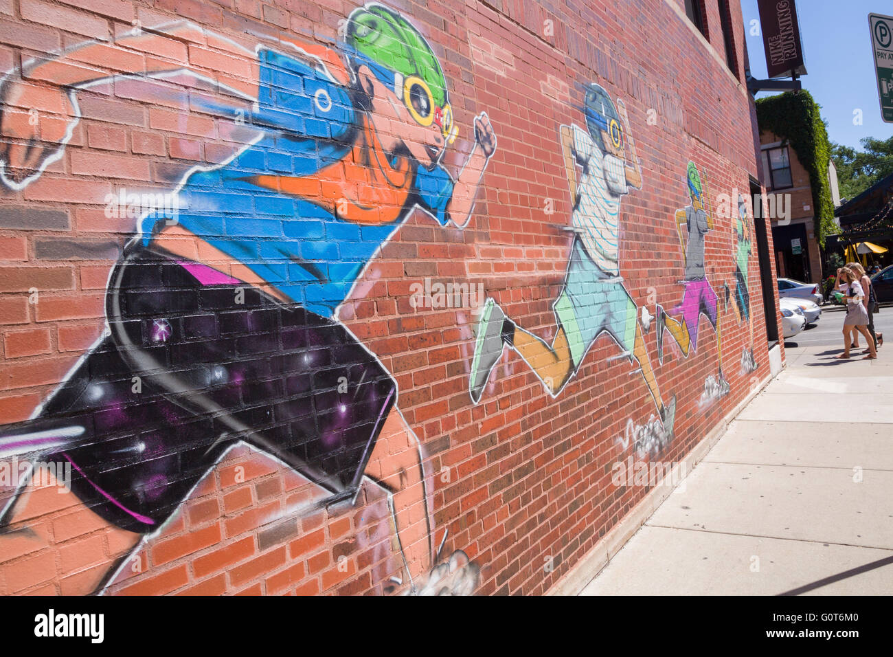 Hebru Brantey Nike Running murale di strada su un muro nel quartiere alla  moda di Wicker Park quartiere del West Town comunità a Chicago, Illinois,  Stati Uniti d'America Foto stock - Alamy