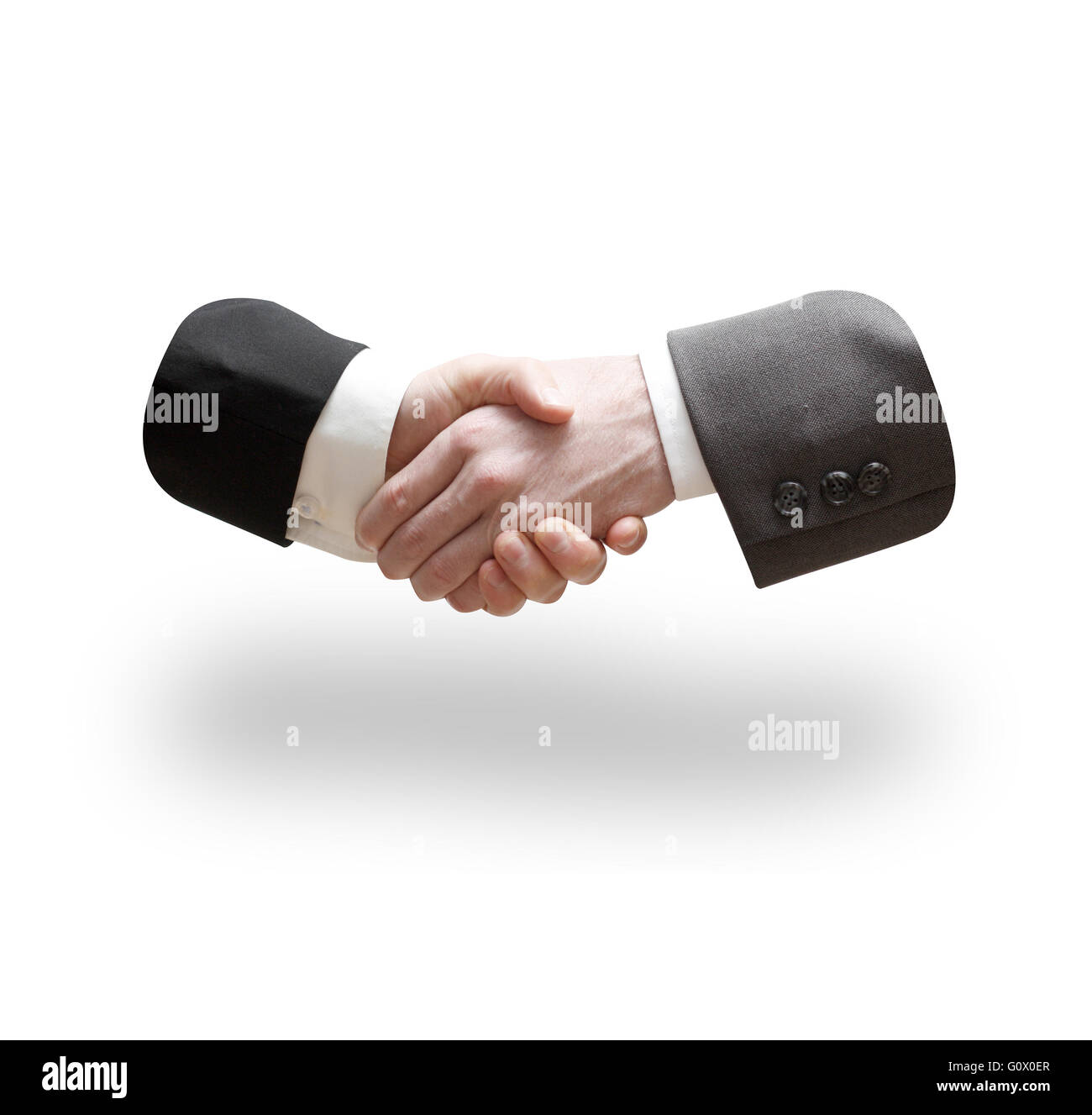 Due uomini di affari stringono le mani Foto Stock