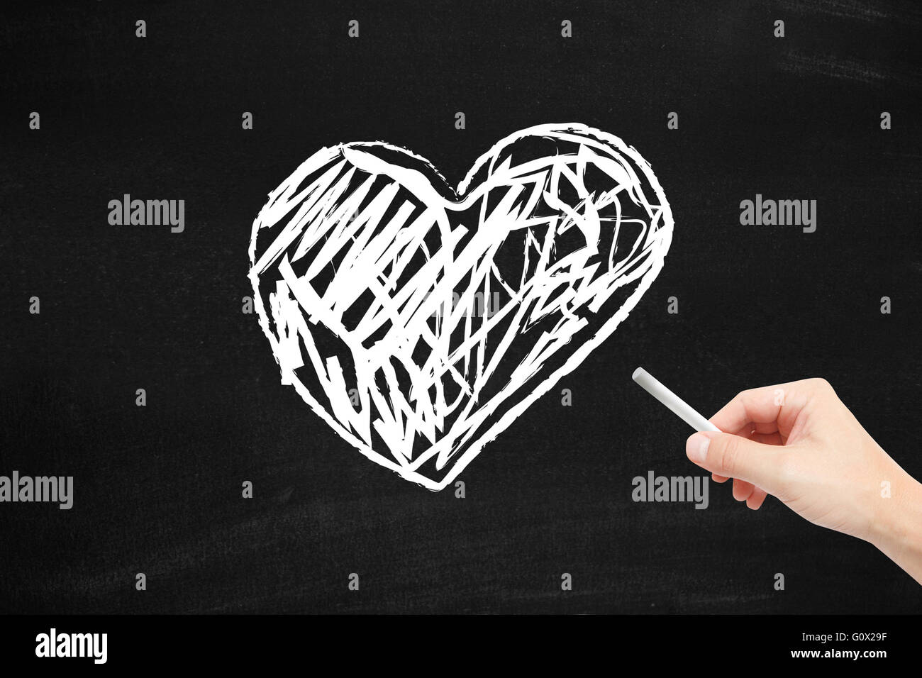 Cuore scritti su una lavagna Foto Stock