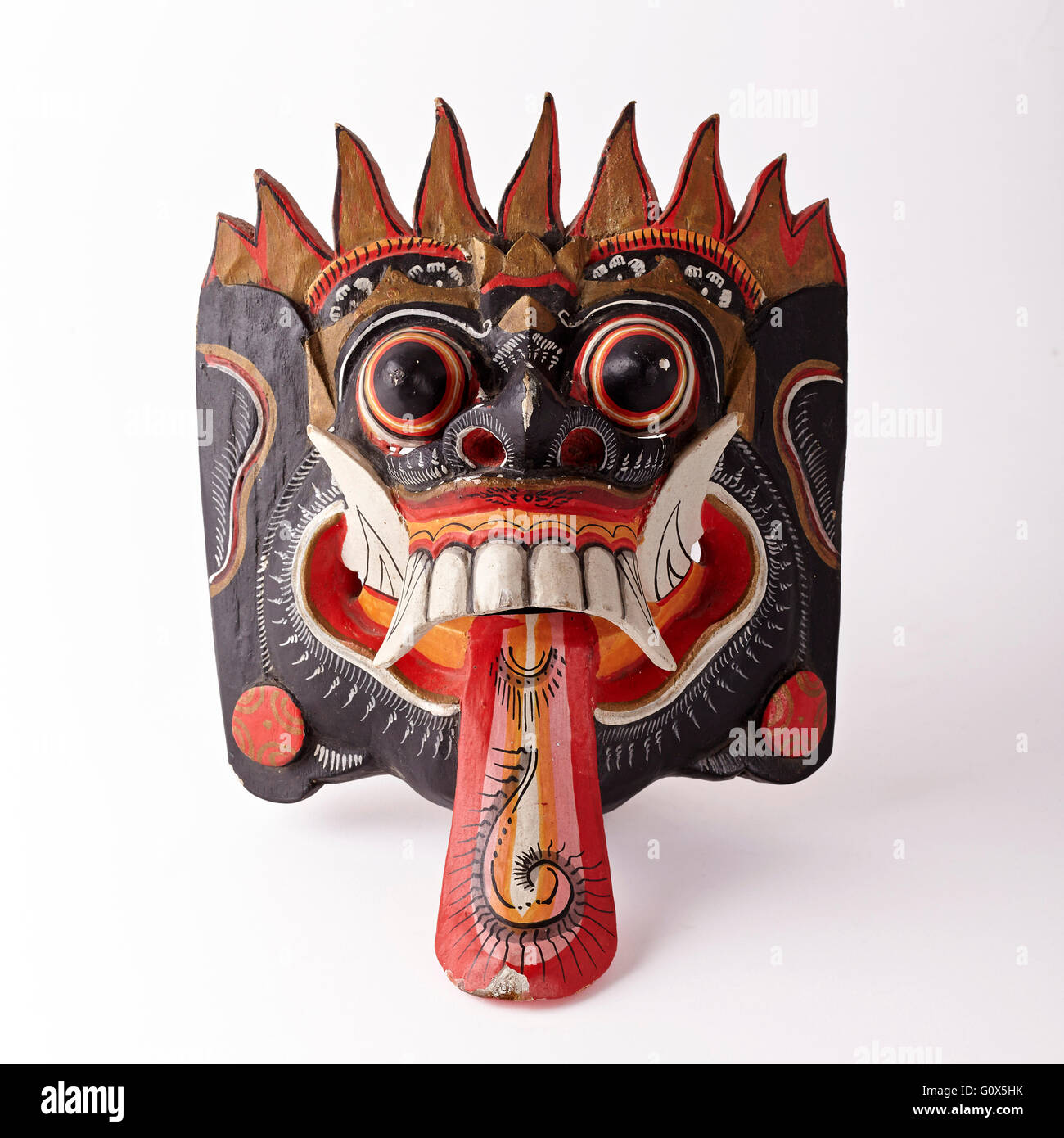 Maschera in legno policromo. Bali. Indonesia. Asia. Foto Stock
