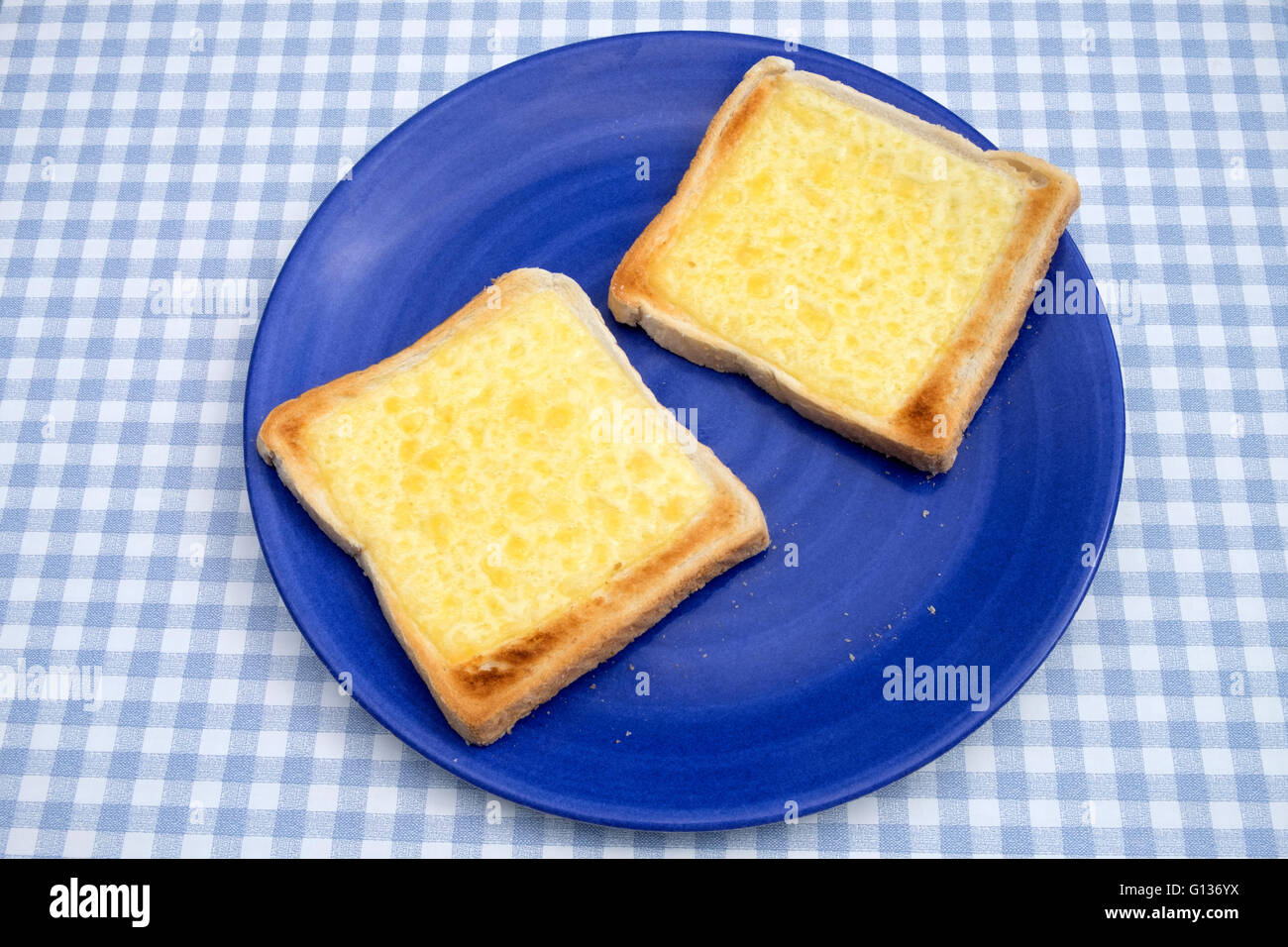 Formaggio su pane tostato Foto Stock