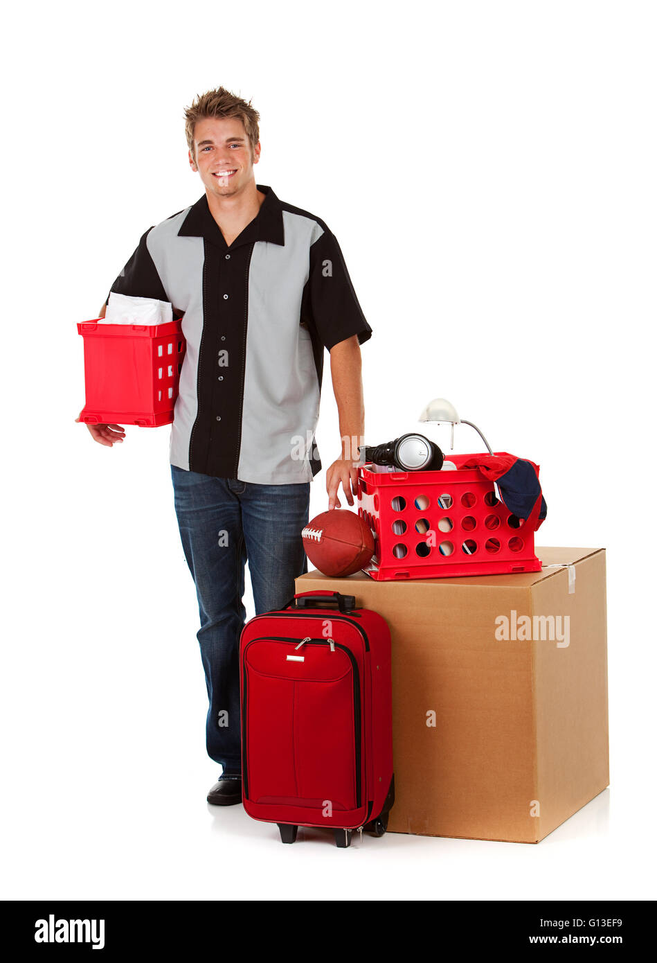 Studente: Teen in piedi con College fornisce Foto Stock