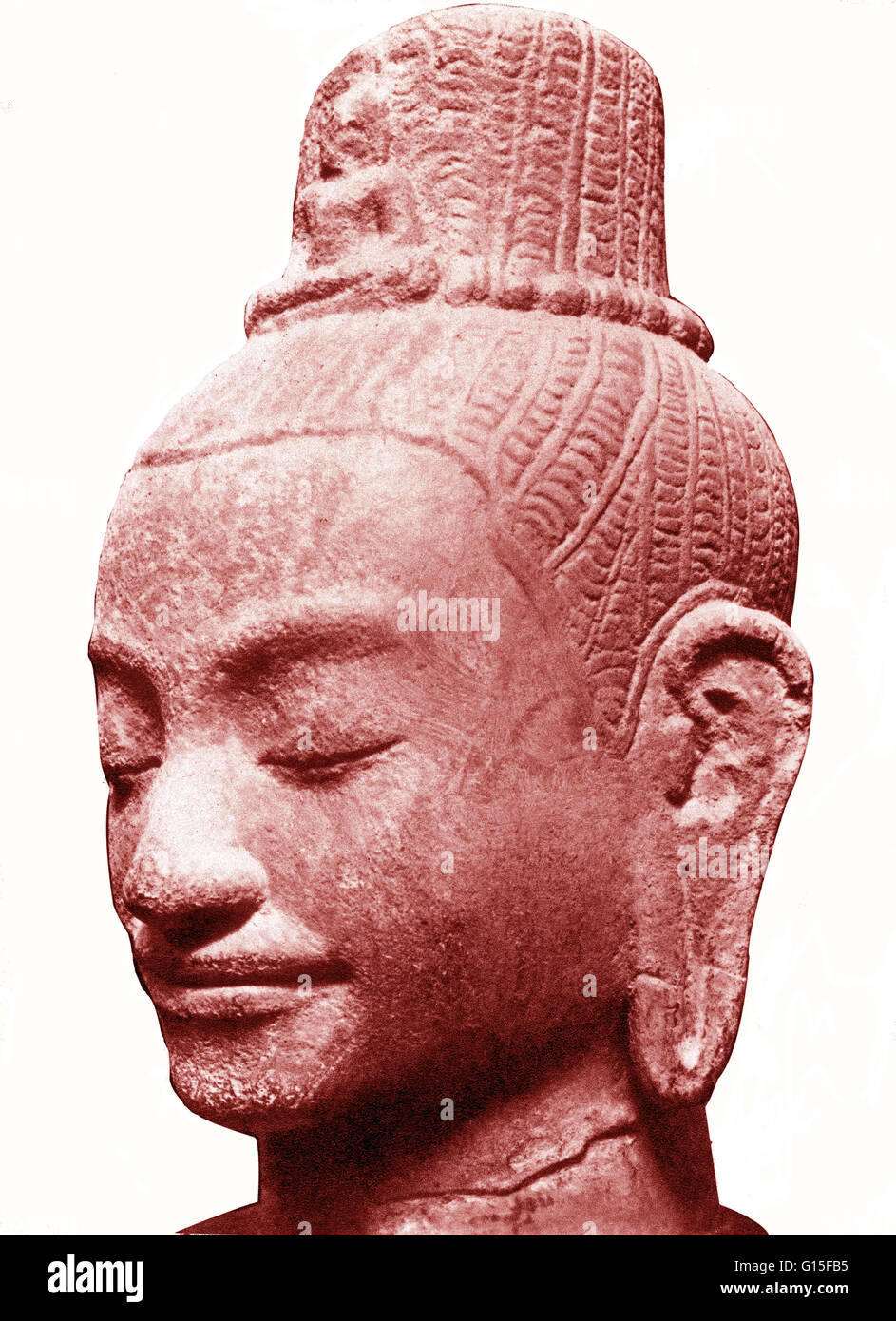Testa di Khmer di Lokeshvara, pietra, Cambogia. Xii-XIII secolo. Lokeshvara, tradotto come "Colui che guarda il mondo", è la realizzazione di compassione nel buddismo Mahayana. Questa scultura raffigura Amoghapasa Lokeshvara, chi è il figlio spirituale di Buddha Am Foto Stock
