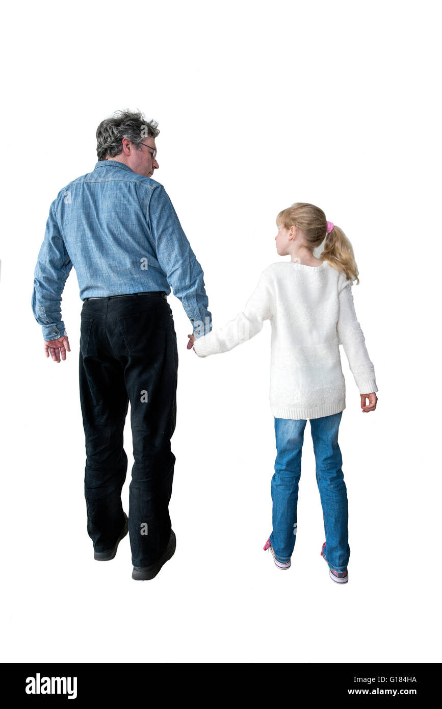 Padre e figlia a piedi, torna alla fotocamera,whiteout,intaglio, Foto Stock