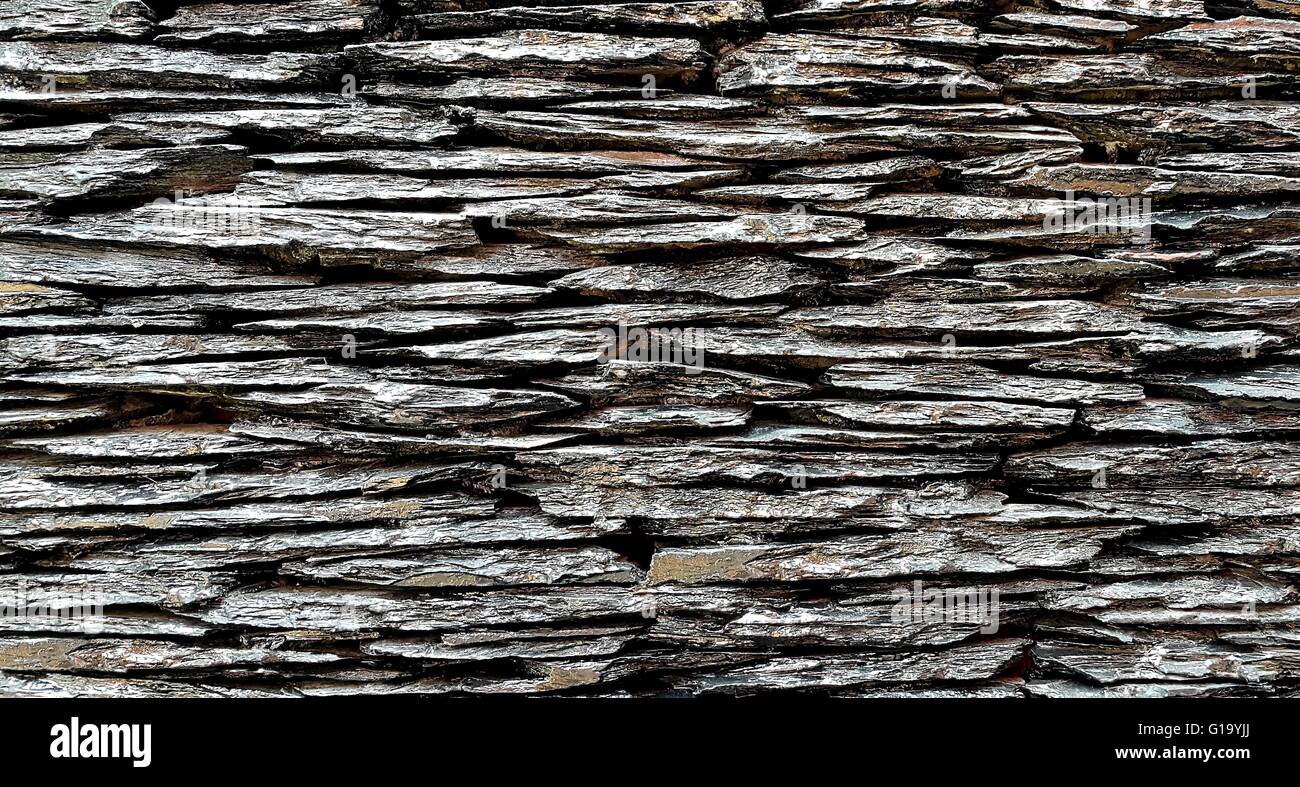 Marrone a muro di pietra sfondo texture Foto Stock