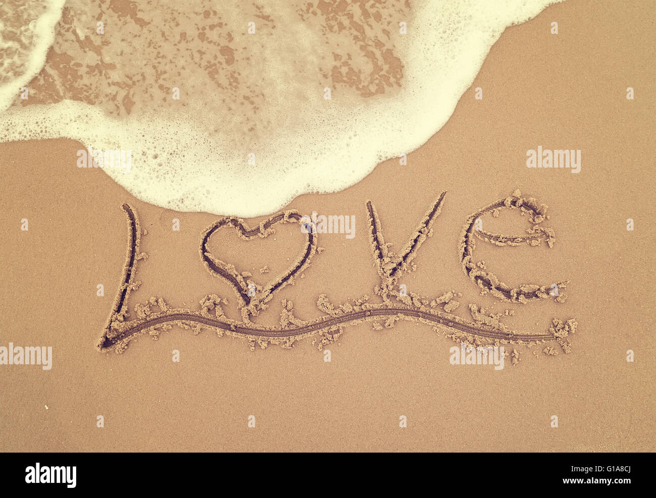 Amore nella sabbia Foto Stock