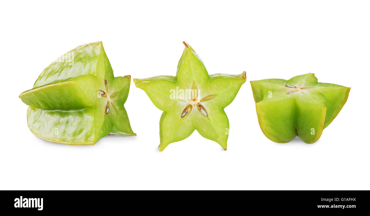 Giallo-verde carambole star a fette di frutta isolato su sfondo bianco Foto Stock