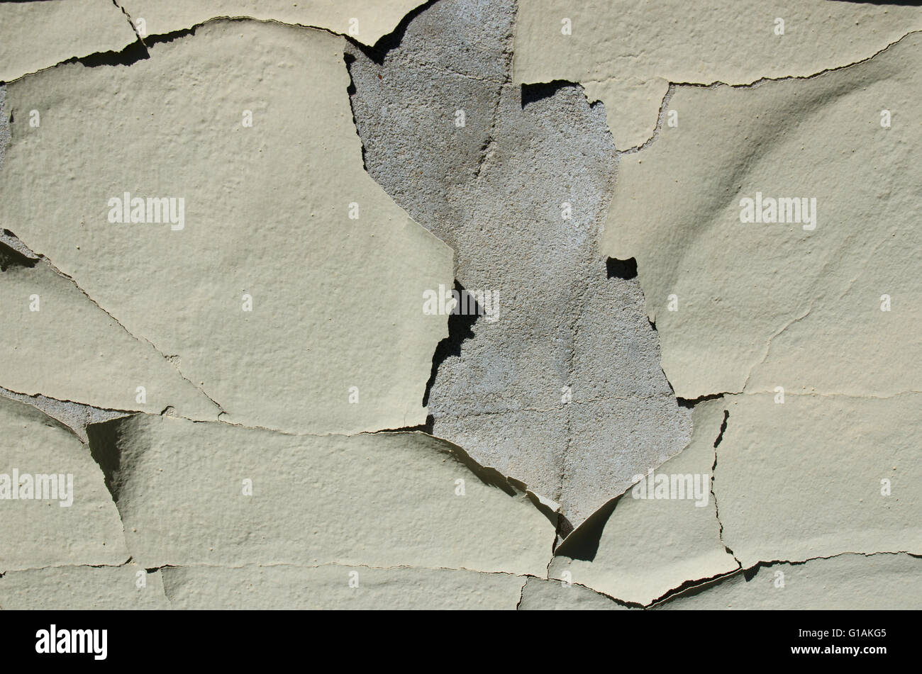 Vernice scrostata off una pietra o calcestruzzo sfondo, grunge texture. Foto Stock