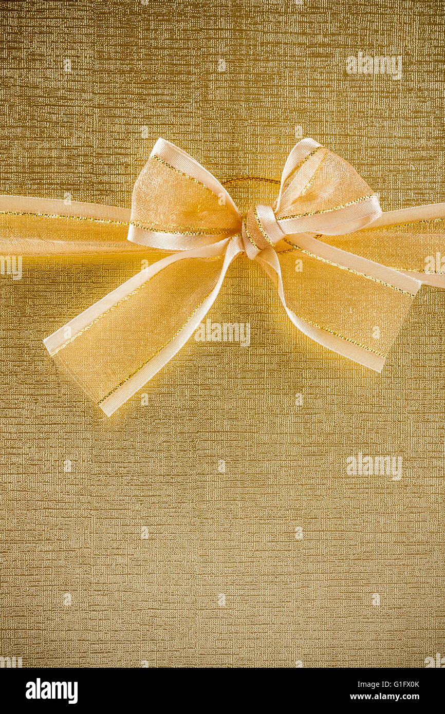 Golden design di confezione regalo per lo sfondo. Foto Stock