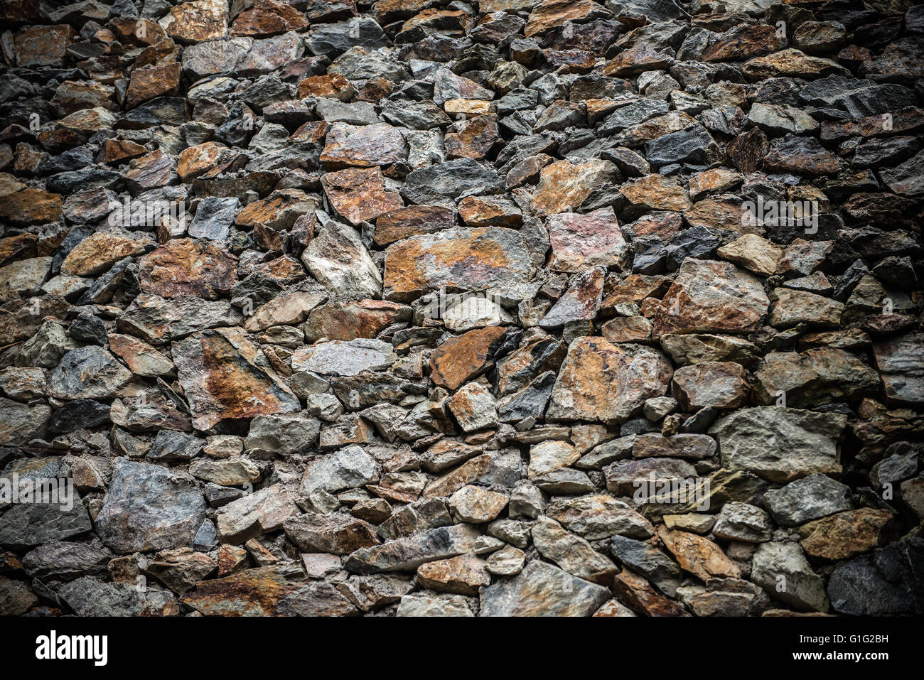 Background e texture di parete costituita da rocce Foto Stock