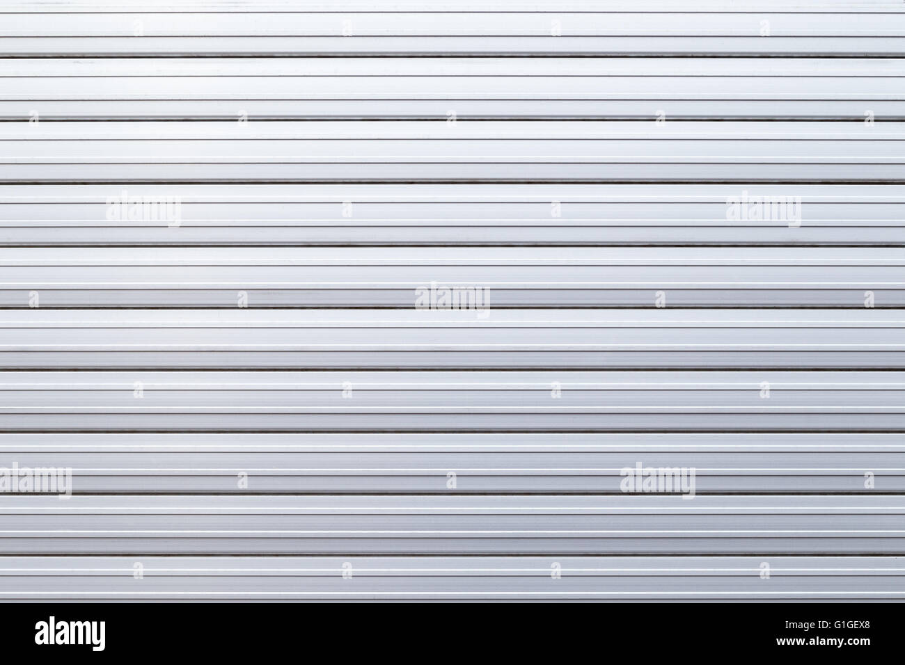 Sicurezza porta rullo o la porta del garage di sfondo - lamiera grecata. Foto Stock