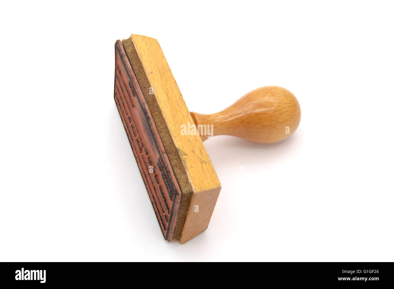 Vecchio francobollo di legno isolato su sfondo bianco Foto Stock