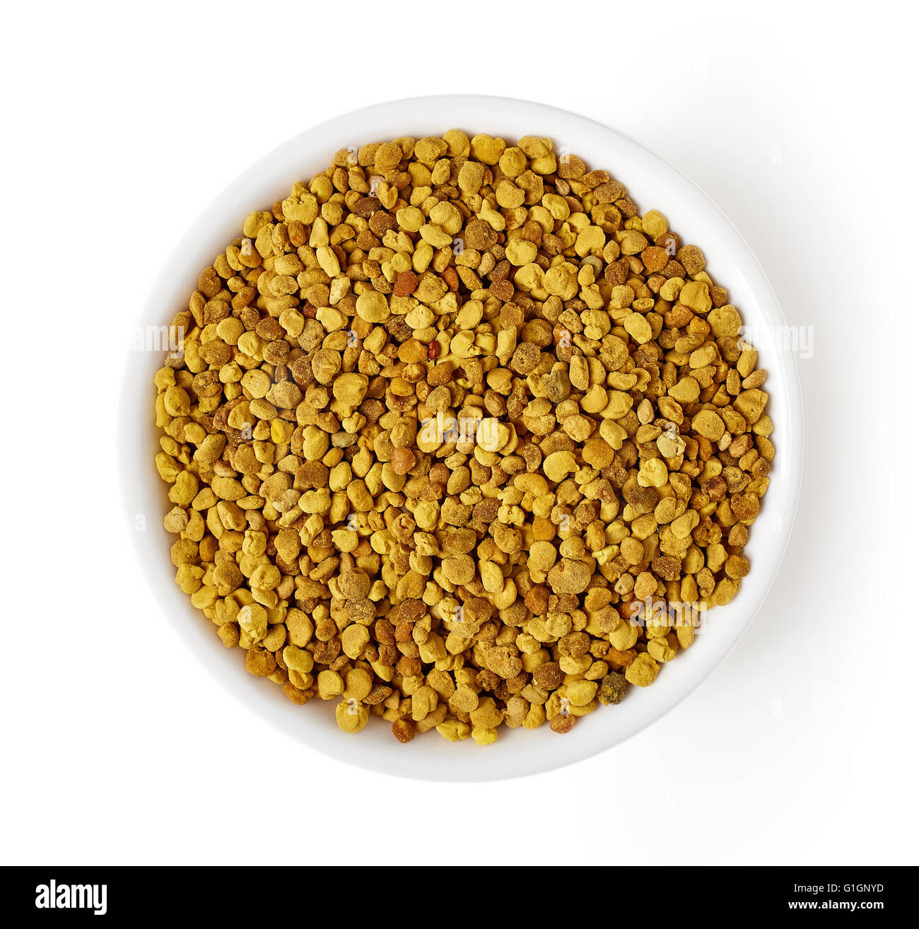 Ciotola di polline di api isolati su sfondo bianco, vista dall'alto Foto Stock