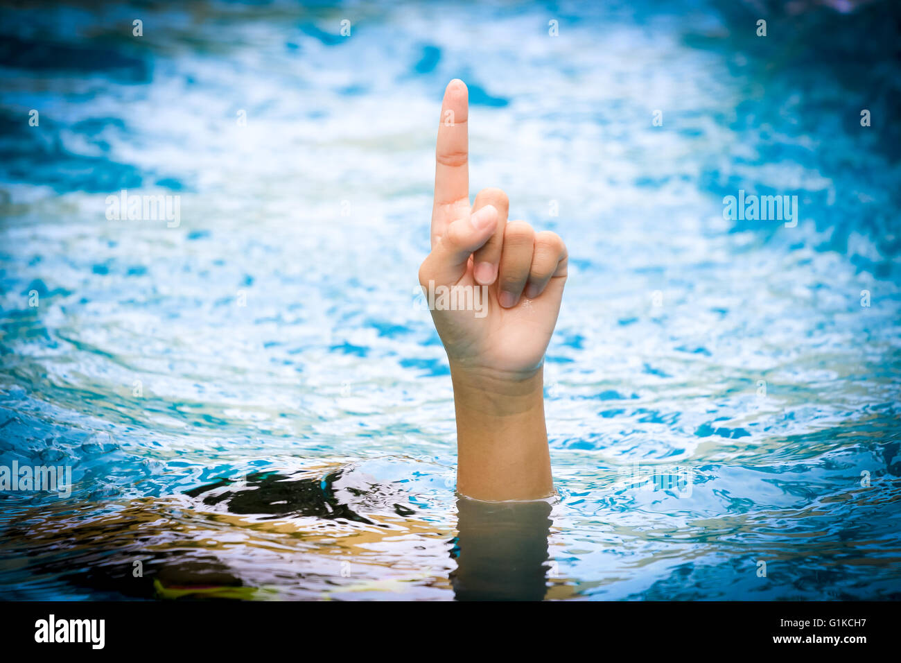 Il numero uno concetto, vincitore concetto,un dito vieni da acqua Foto Stock