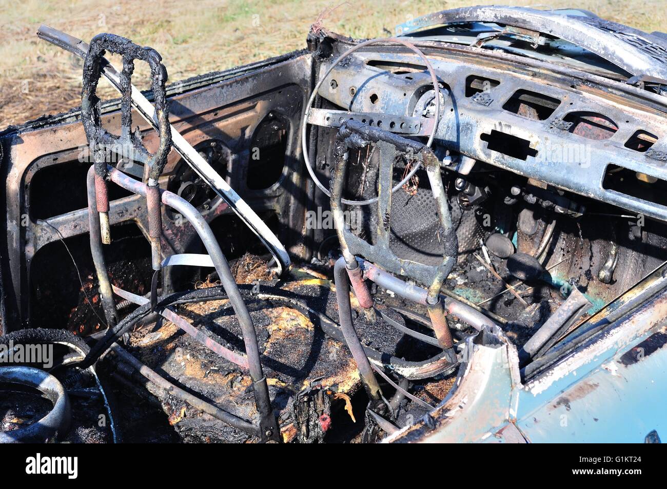 Interno del bruciato auto rottamata in incidente Foto Stock