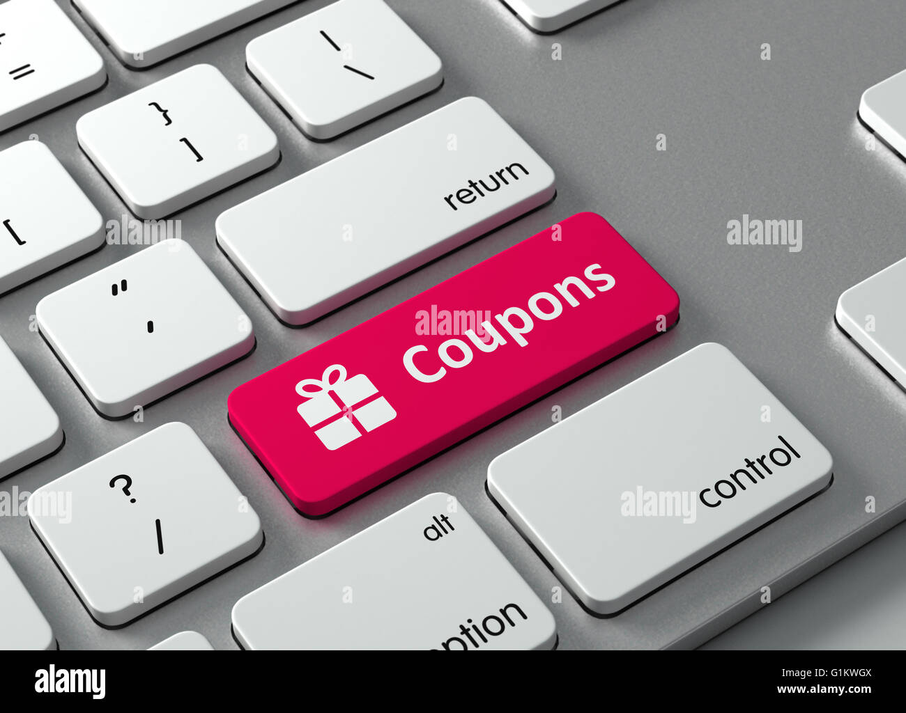Una tastiera con un pulsante rosso coupon Foto Stock