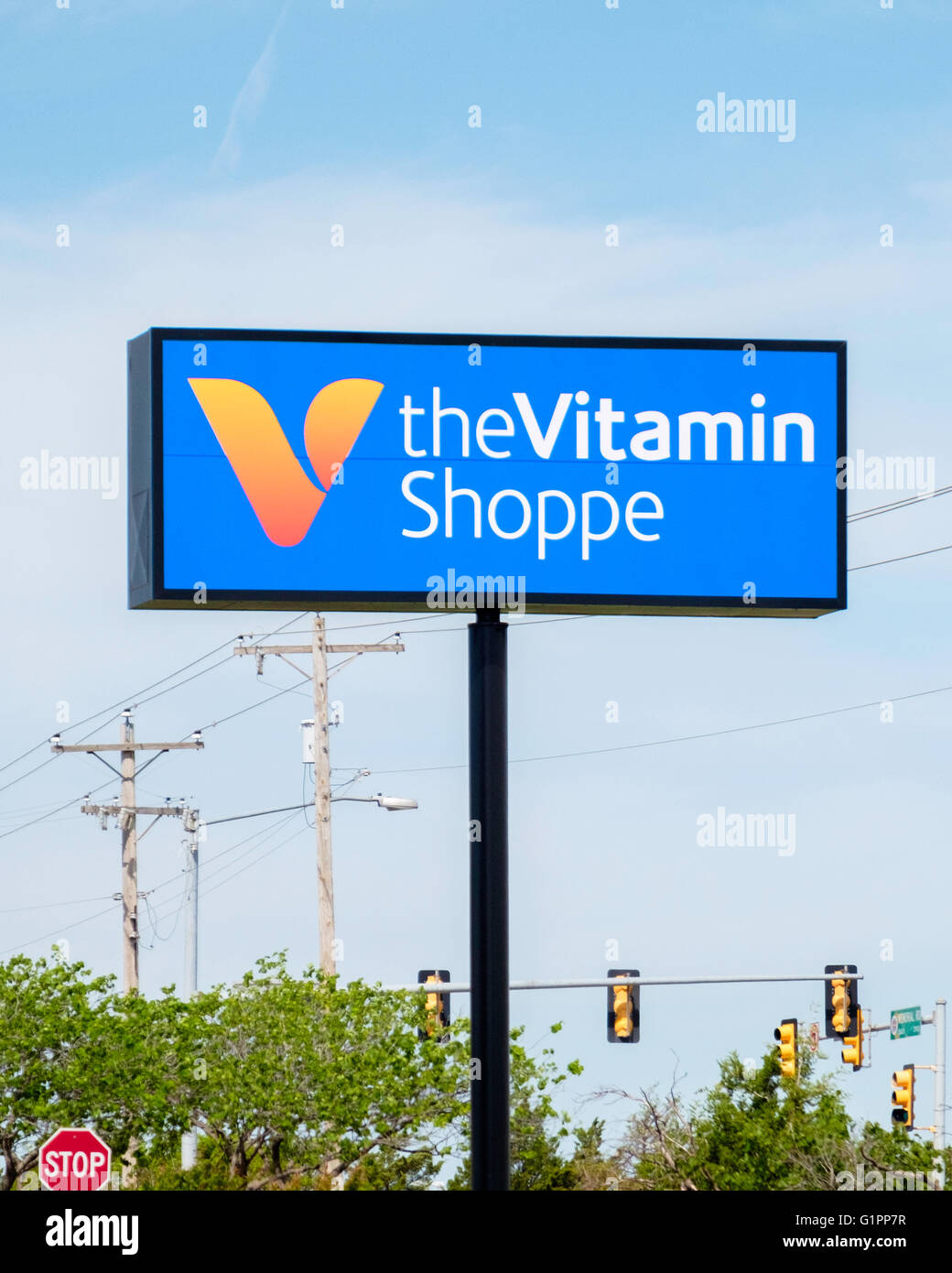 Un polo di segno pubblicità la vitamina Shoppe nella città di Oklahoma, Oklahoma, Stati Uniti d'America. Foto Stock