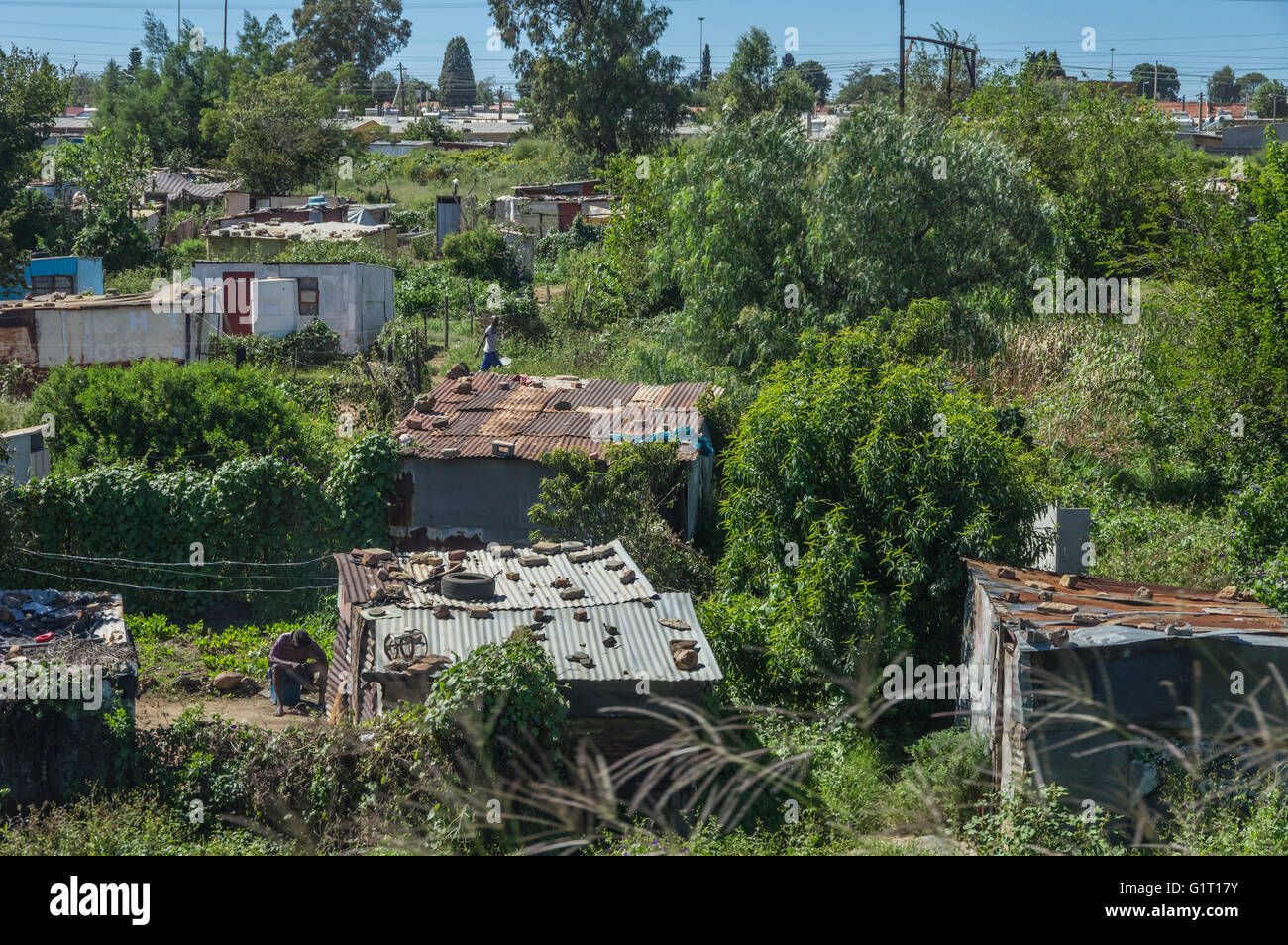 Il sobborgo di Johannesburg di Soweto è una miscela di nuove case pubbliche e povere abitazioni Foto Stock