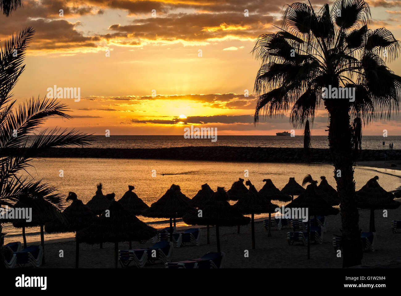 Tramonto sulla spiaggia di Las Americas in Isole Canarie Foto Stock