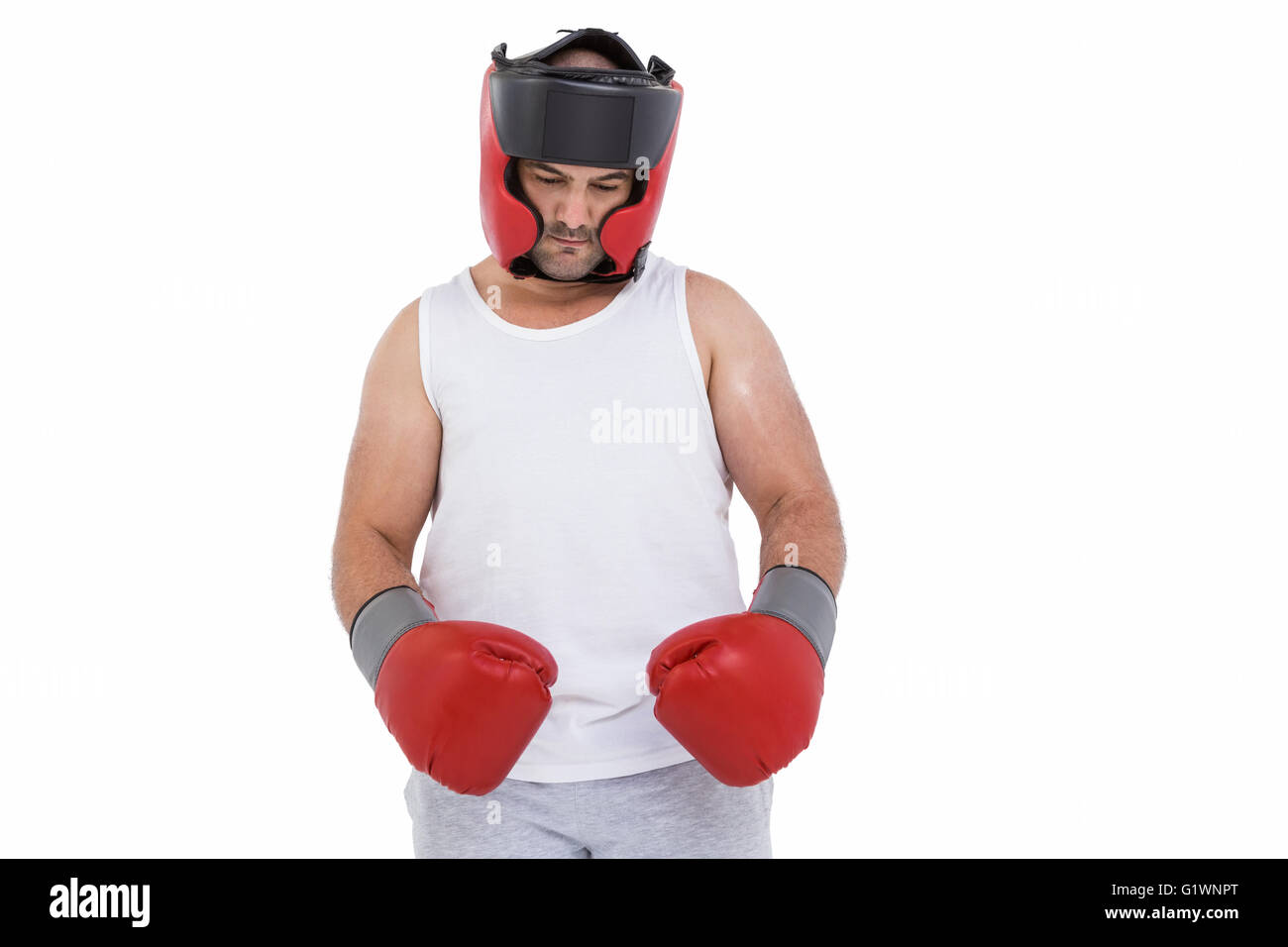Boxer che indossa la protezione della testa e dei guanti di protezione Foto Stock
