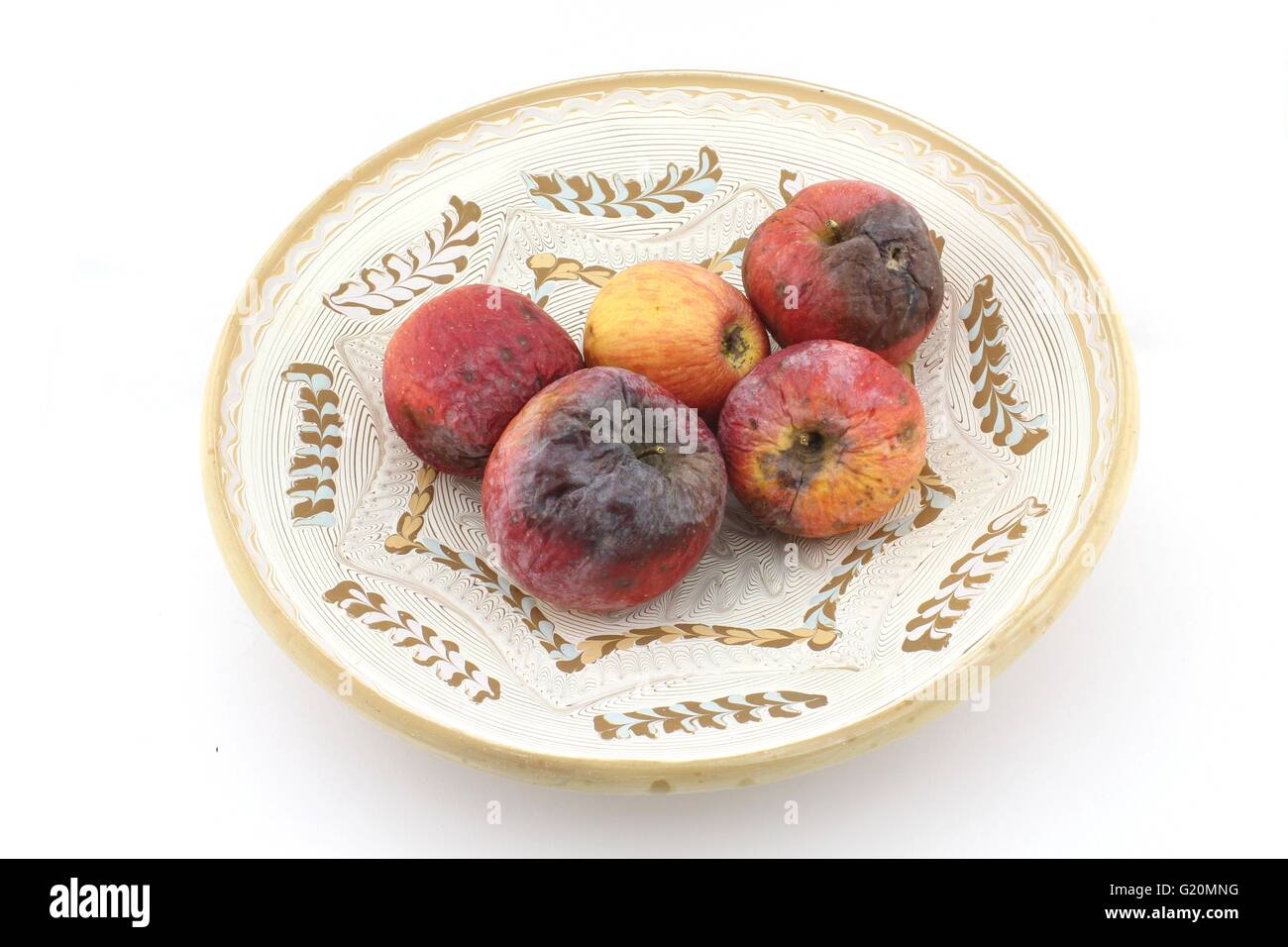 Mele marce su piastra Foto Stock