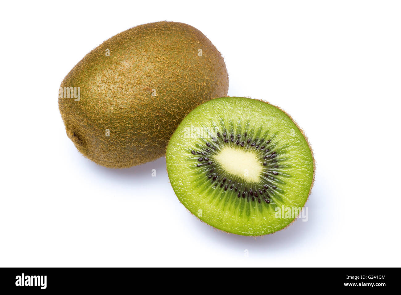 Un intero e metà kiwi come tagliare . Foto Stock