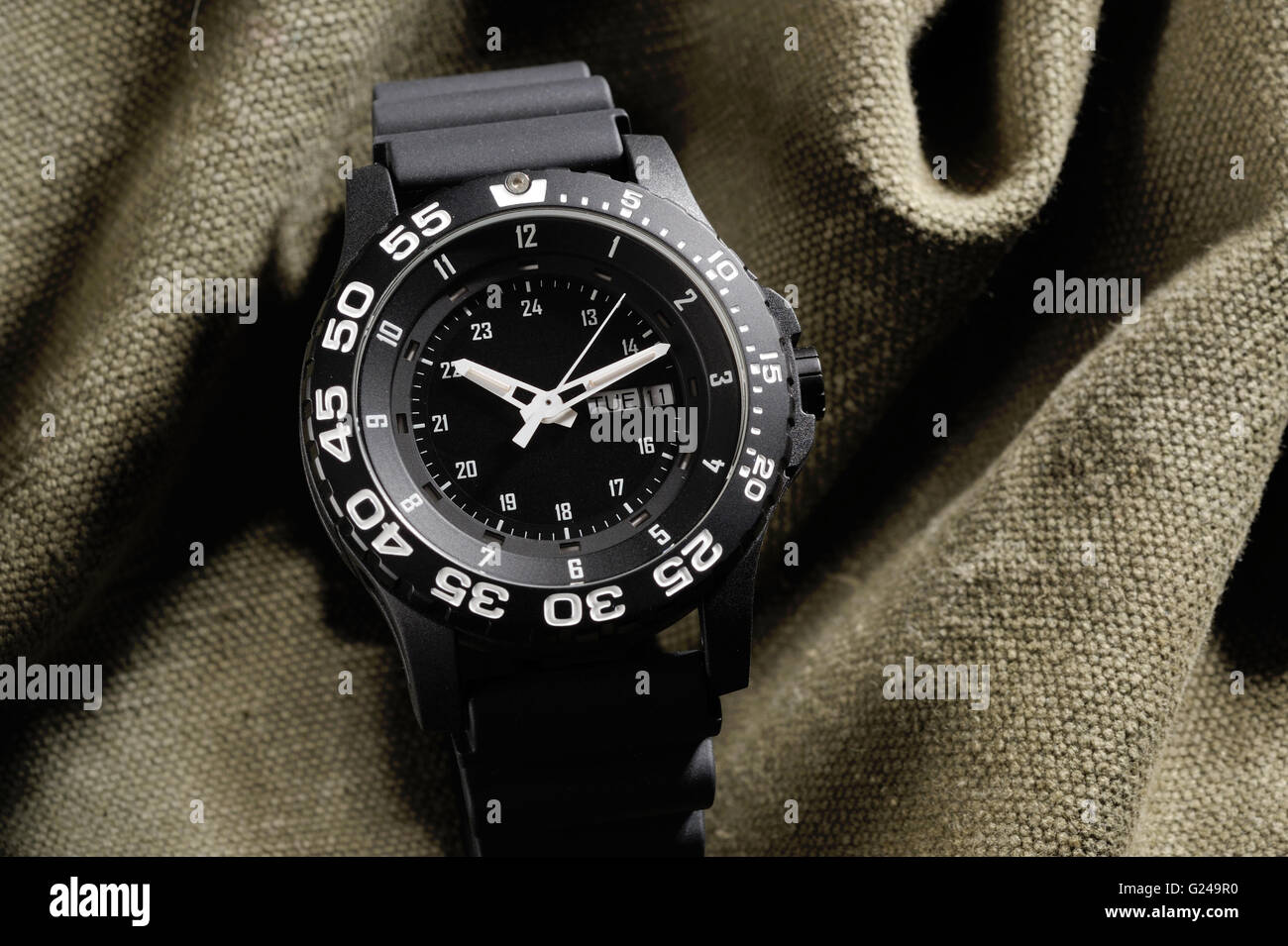 Trizio military watch sul panno di mimetizzazione Foto Stock