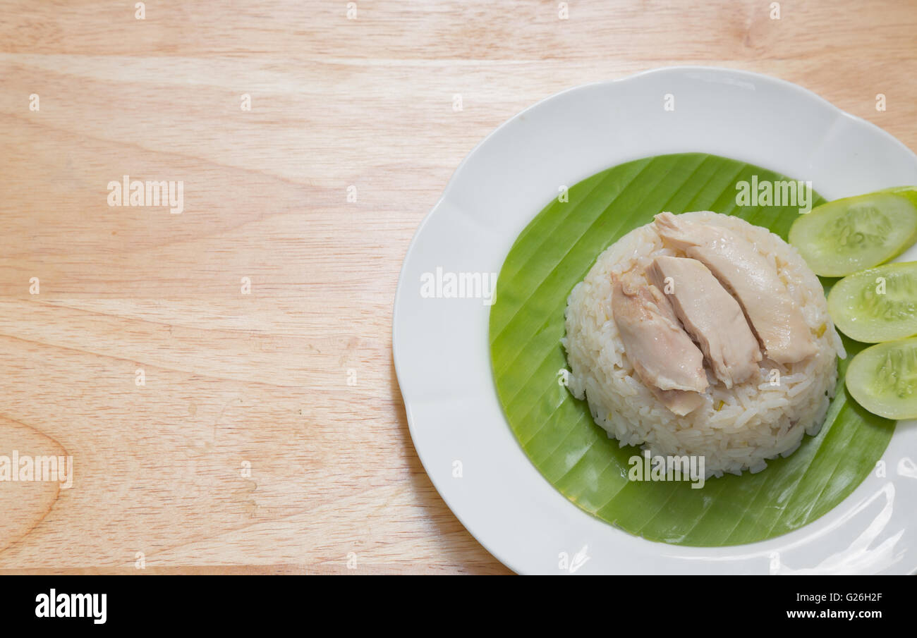 Pollo Hainanese riso è più comunemente associata a Singapore, malesi e cucine Hainanese, sebbene sia anche popul Foto Stock