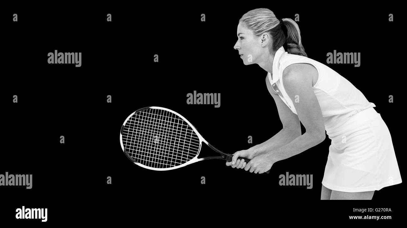 Atleta giocando a tennis con una racchetta Foto Stock