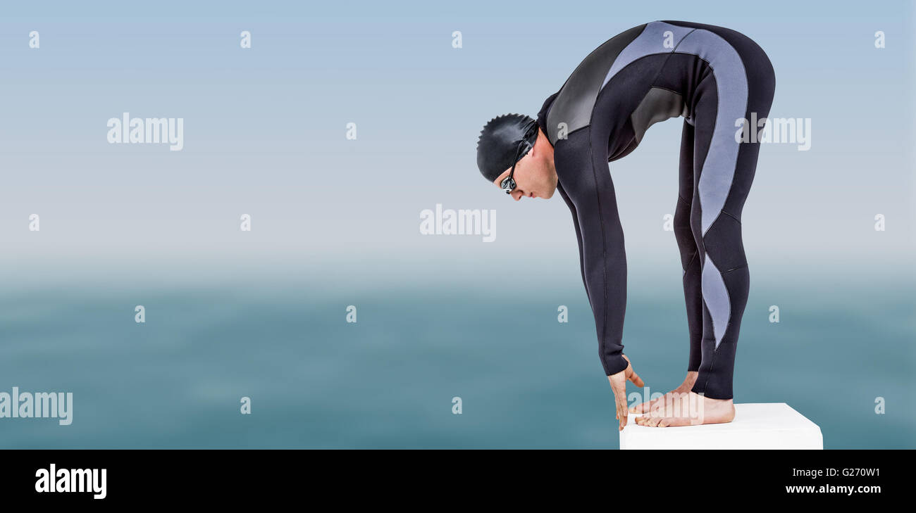 Immagine composita del nuotatore muta in preparazione a immersione Foto Stock