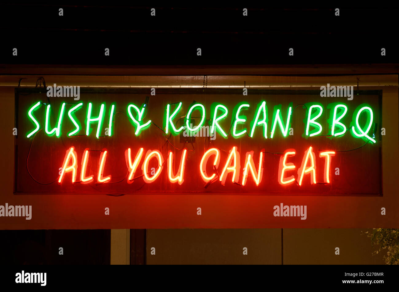 Neon di tutto quello che potete mangiare al segno sulla parte esterna di un ristorante asiatico a Vancouver, British Columbia, Canada Foto Stock