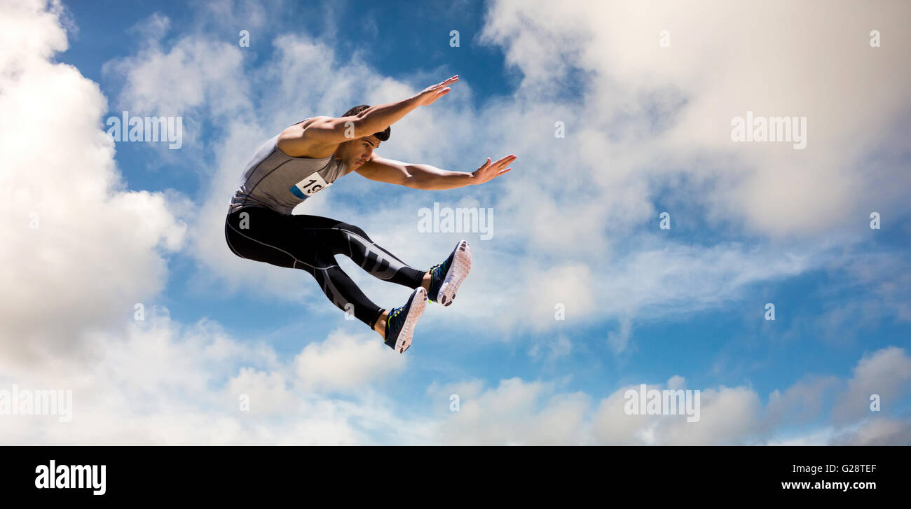 Immagine composita del ritratto di uno sportivo jumping Foto Stock