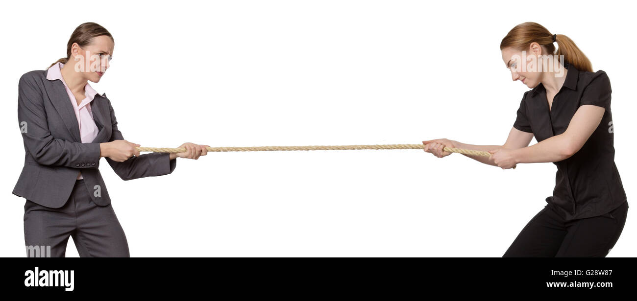 Ufficio lavoratori tirando la corda in un rimorchiatore di guerra. Foto Stock