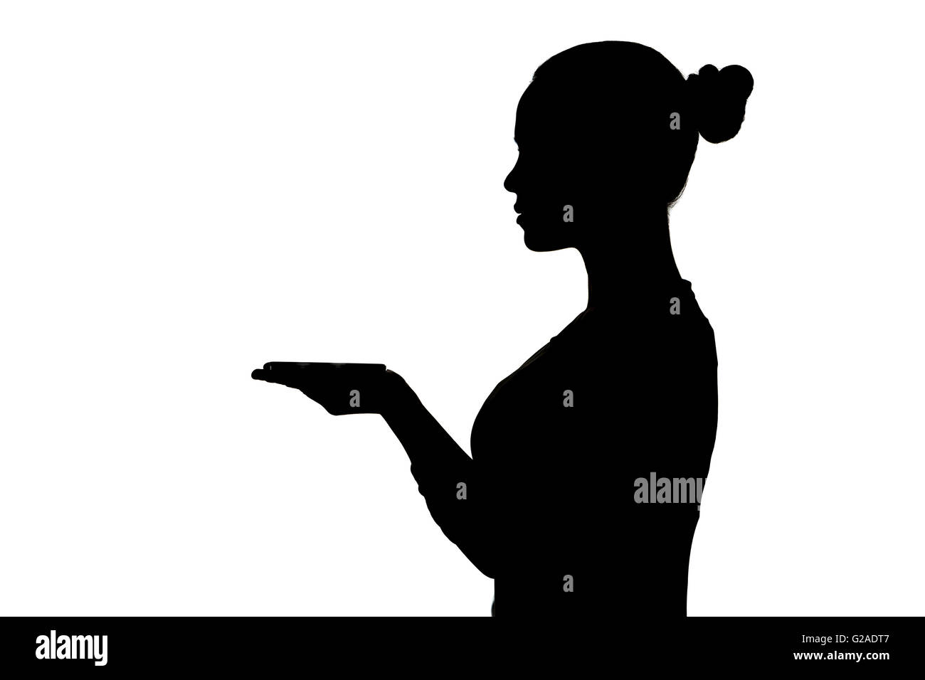 Silhouette di cameriera su sfondo bianco Foto Stock