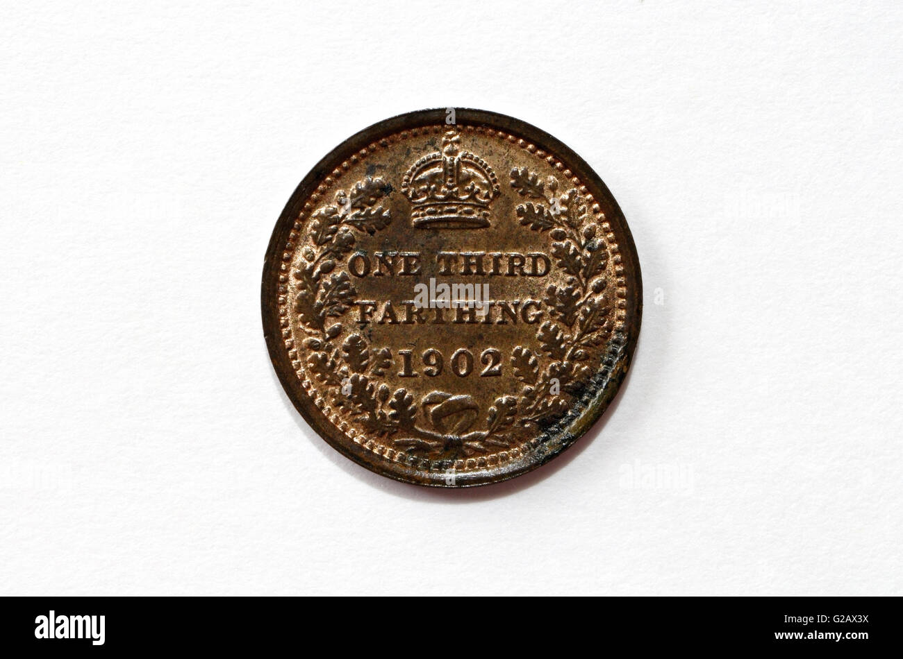 British un terzo di farthing Moneta di bronzo datata 1902 Foto Stock