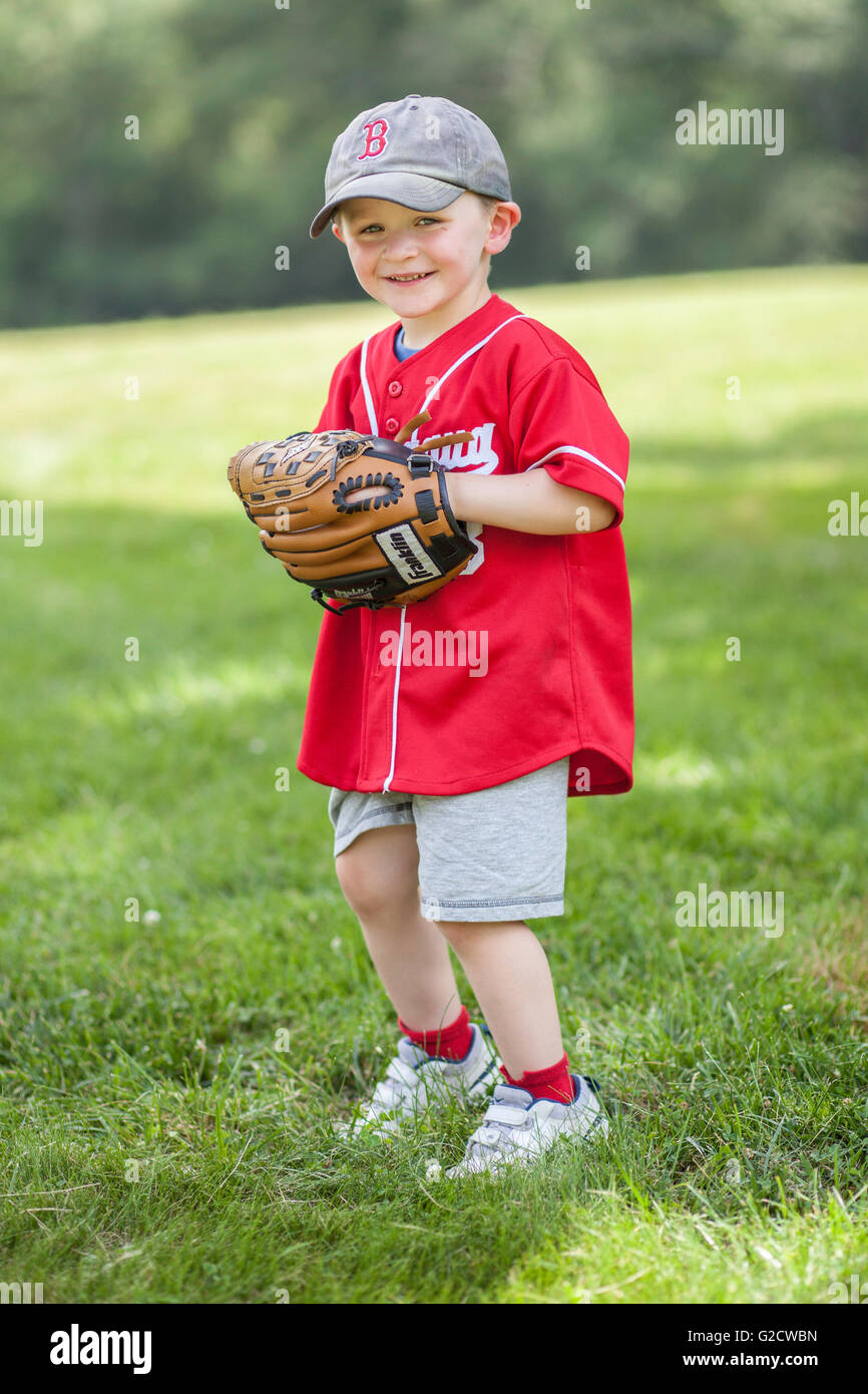 Tre anni nella sua uniforme di baseball Foto Stock